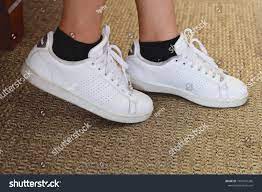 white shoes with black socks